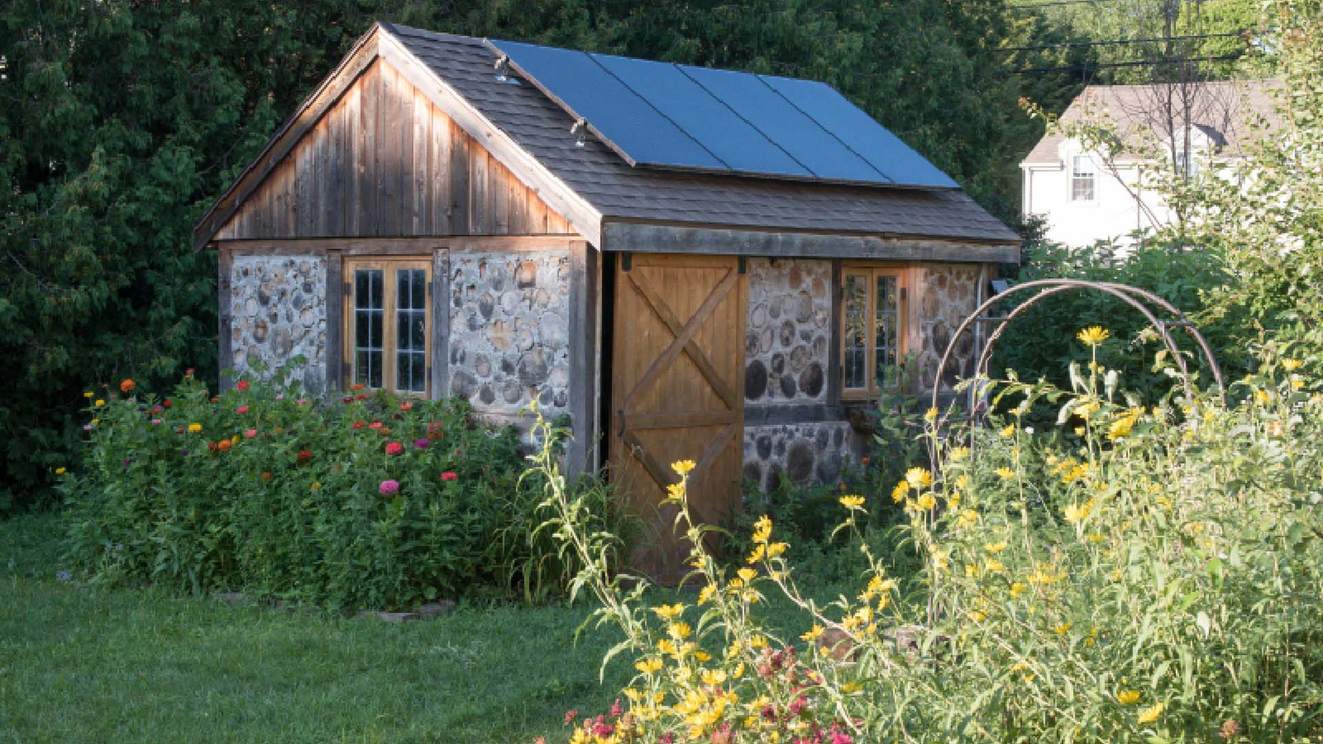Small residential solar panel array on a workshop roof — the project that started it all